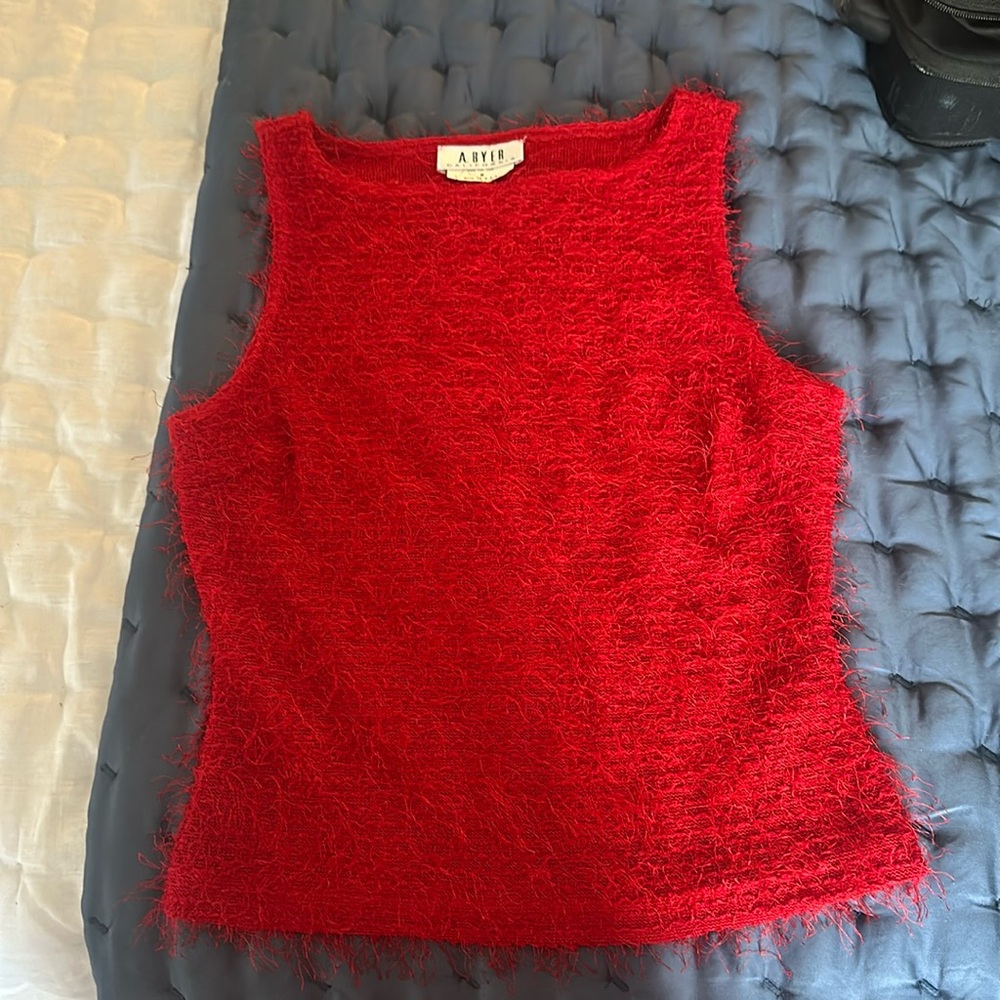Red sleeveless blouse